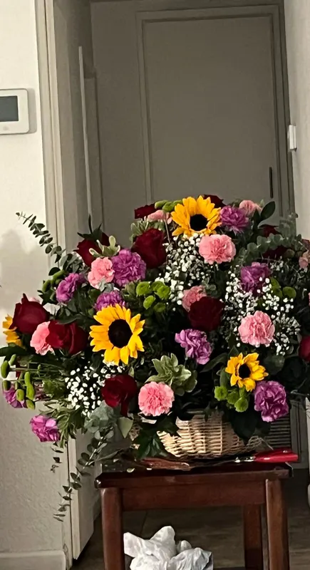 Flower basket with sunflowers, roses and carnations, Coachella Valley bouquets by GZ Flowers