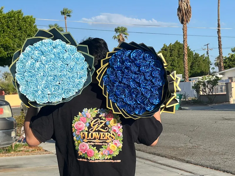 Two satin ribbon-rose bouquets in sky blue and royal blue, eternal roses by GZ Flowers Cathedral City