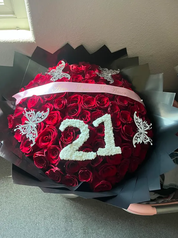 Red rose bouquet with a white 21 and silver butterflies by GZ Flowers, Cathedral City CA
